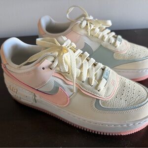 Nike Women's Dunk Sneakers in Cream, Pink, and Gray